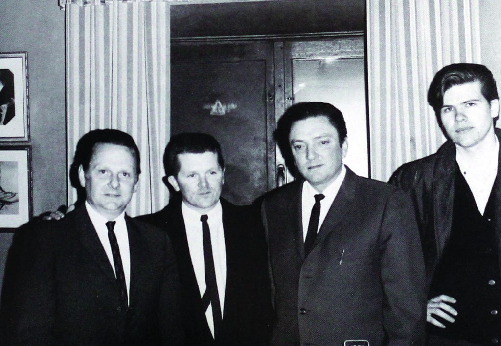 Urban Haglund with the Stanley Brothers, March 14, 1966. Left to right: Ralph Stanley, Rune Krongårdh (publisher of Western Songs magazine), Carter Stanley, and Urban.