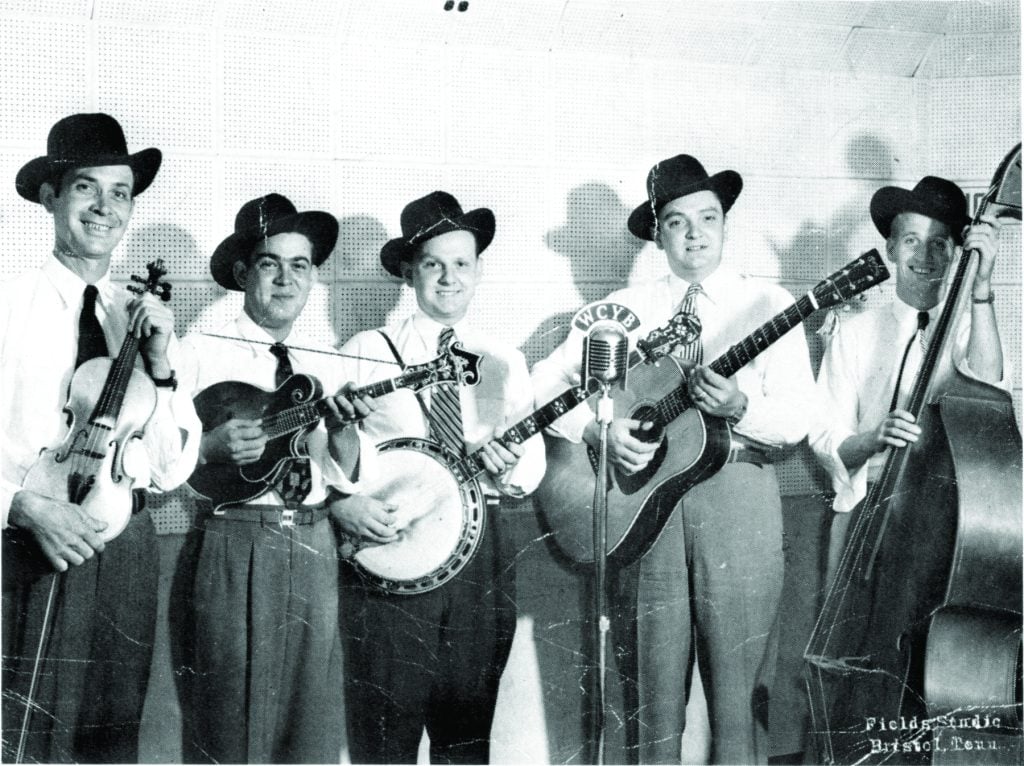 The Clinch Mountain Boys as they appeared in the studios of WCYB in the middle part of 1948. Left to right: Art Wooten, Pee Wee Lambert, Ralph and Carter Stanley, and Ray Lambert. Wooten, a former member of Bill Monroe’s Blue Grass Boys, replaced Leslie Keith as the fiddler in the band in the spring of 1948. It was this group (minus Ray Lambert) that recorded the group’s first bluegrass styled recording, “Molly and Tenbrook.”