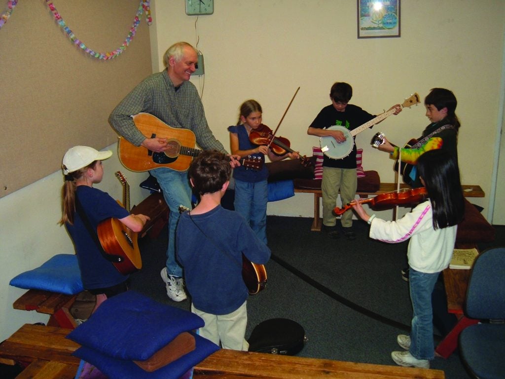 Jack teaching a kids jamming class