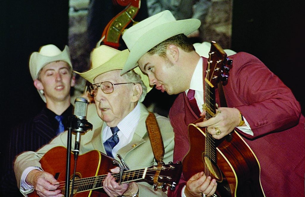 Kody Norris (right) and Alex Leach (left) perform with bluegrass pioneer Curly Seckler at the Paramount Center for the Arts in Bristol, TN in February 2009.  Photo by Penny Parsons