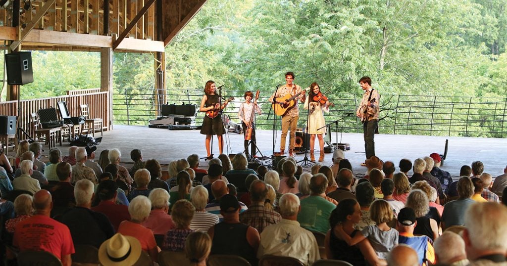 The Band Kelly performing (pre-pandemic) in the John C. Campbell Folk School’s Festival Barn. Photo Courtesy of John C. Campbell Folk School.
