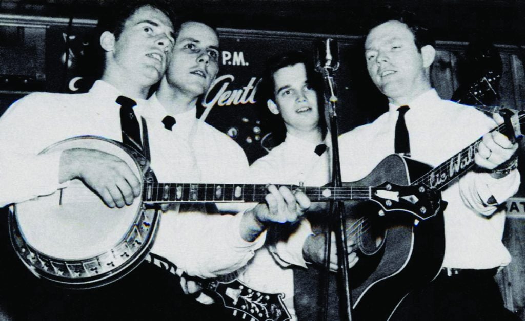 The Country Gentlemen playing their instruments on stage