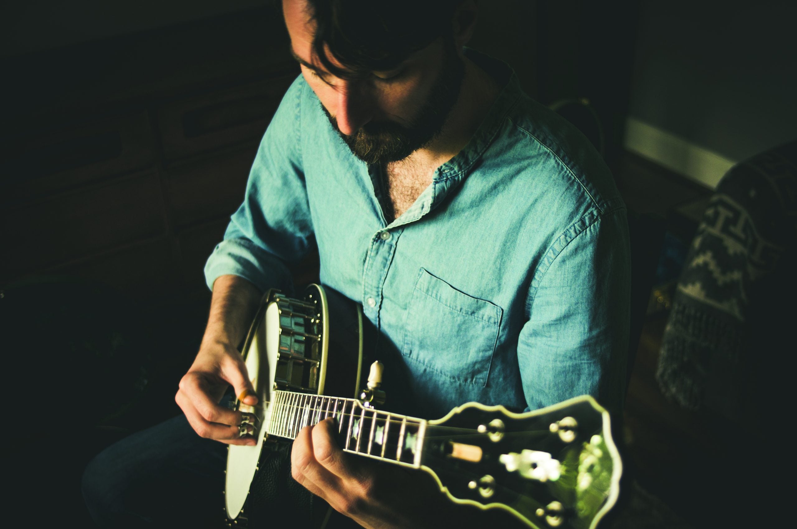 Corbett playing his banjo