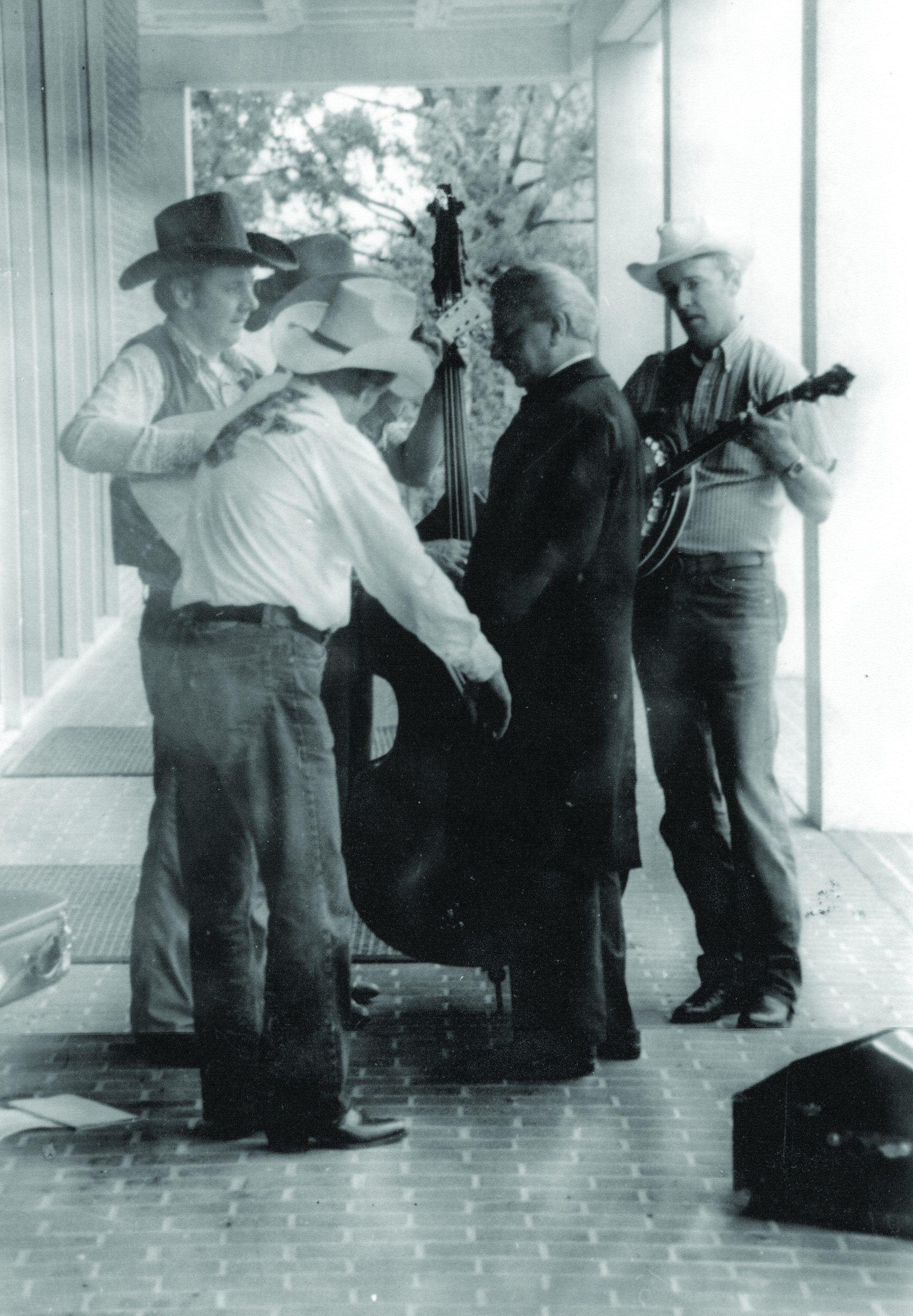 Senator Robert Byrd huddled with Appalachian Reign prior to performance at Episcopal High School in Alexandria VA. 1982 (left to right): Tom Knowles, Earl Brown, Joe Meadows, Sen. Byrd, Lamar Grier. // Photo courtesy Tom Knowles