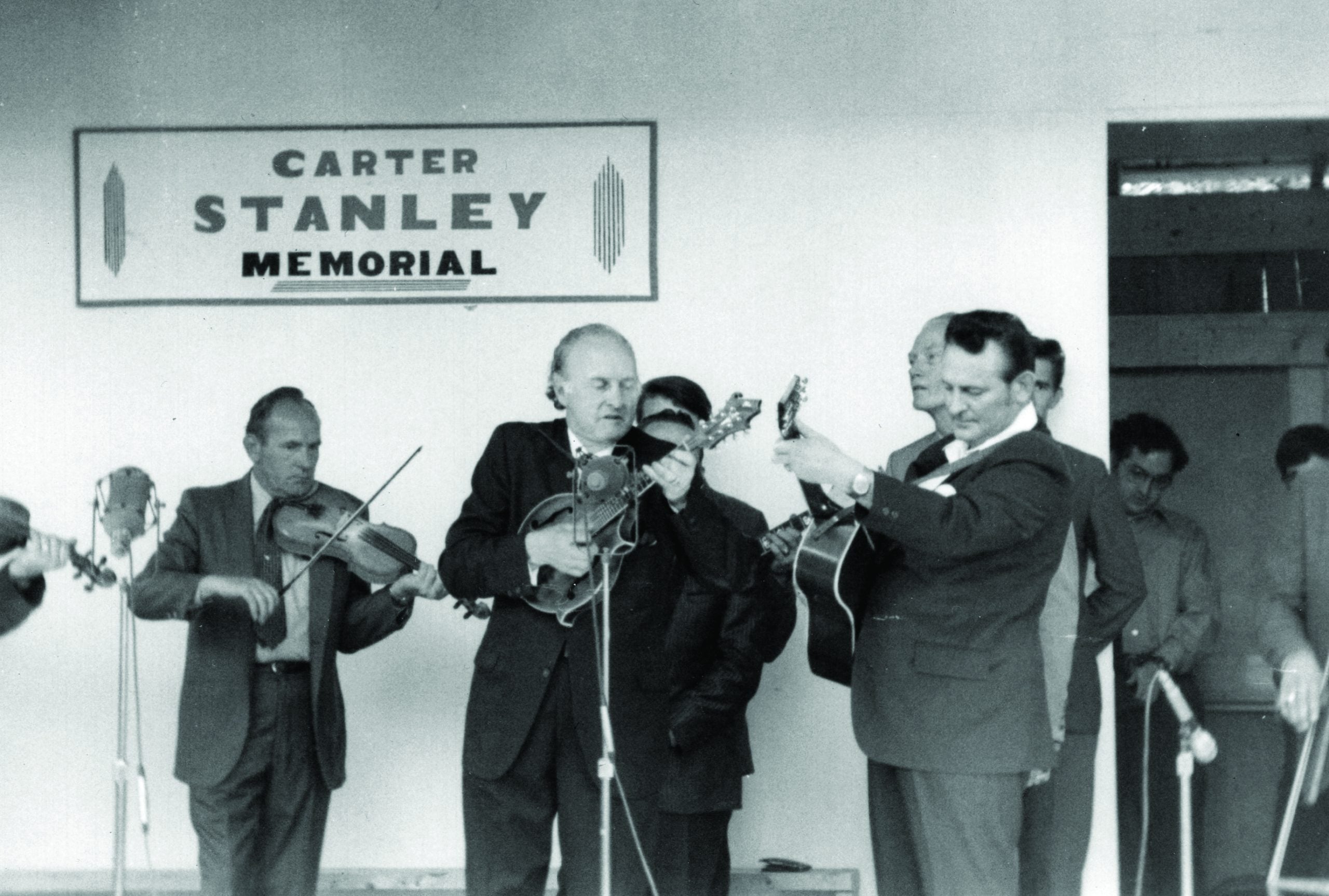 Kenny Baker, Bill Monroe, Red Smiley, and Don Reno perform at the Carter Stanley Memorial Festival, 1971.