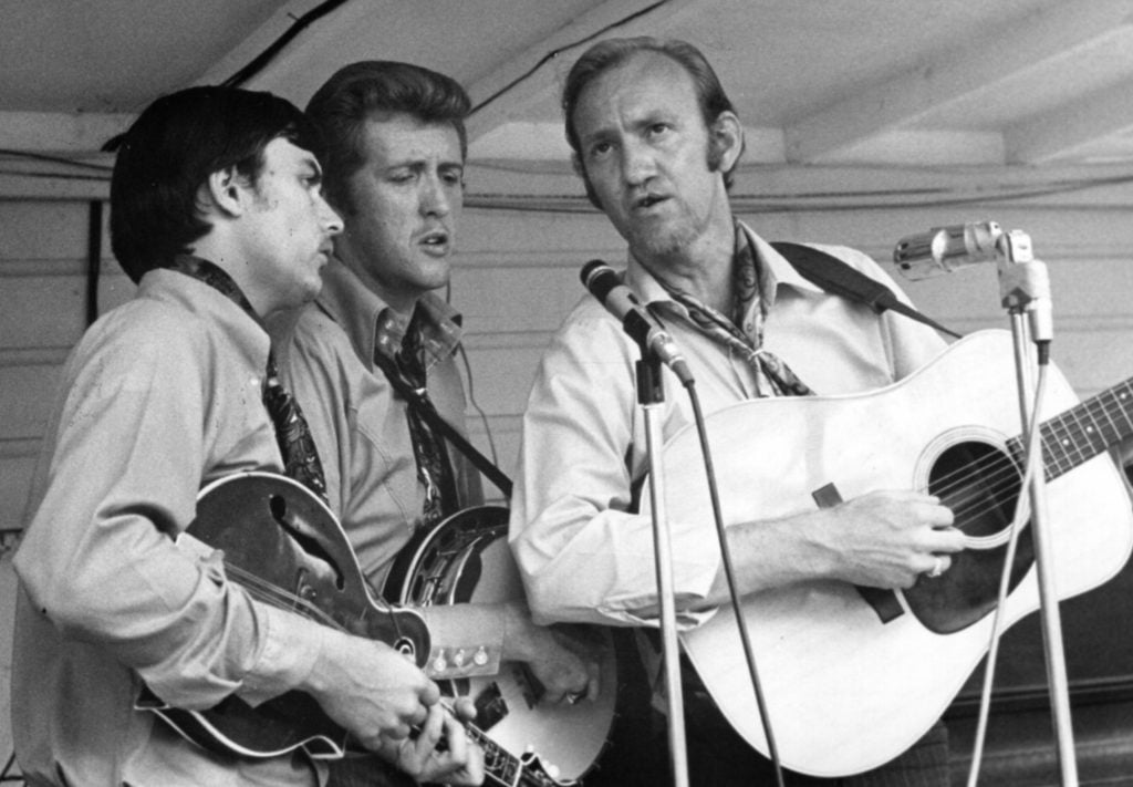 Bottom Right: Larry Rice, J.D. Crowe and Doyle Lawson in Lavonia, Georgia, 1970. Photo by Marty Godbey