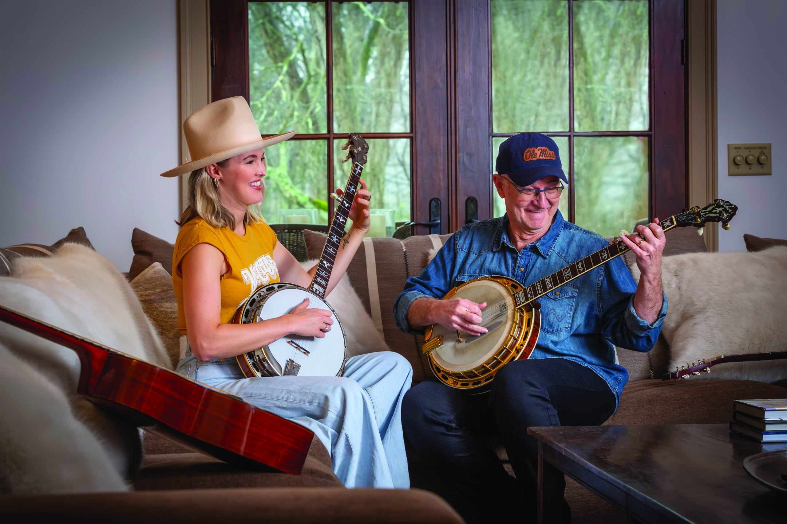 Ashley and her father playing music together.