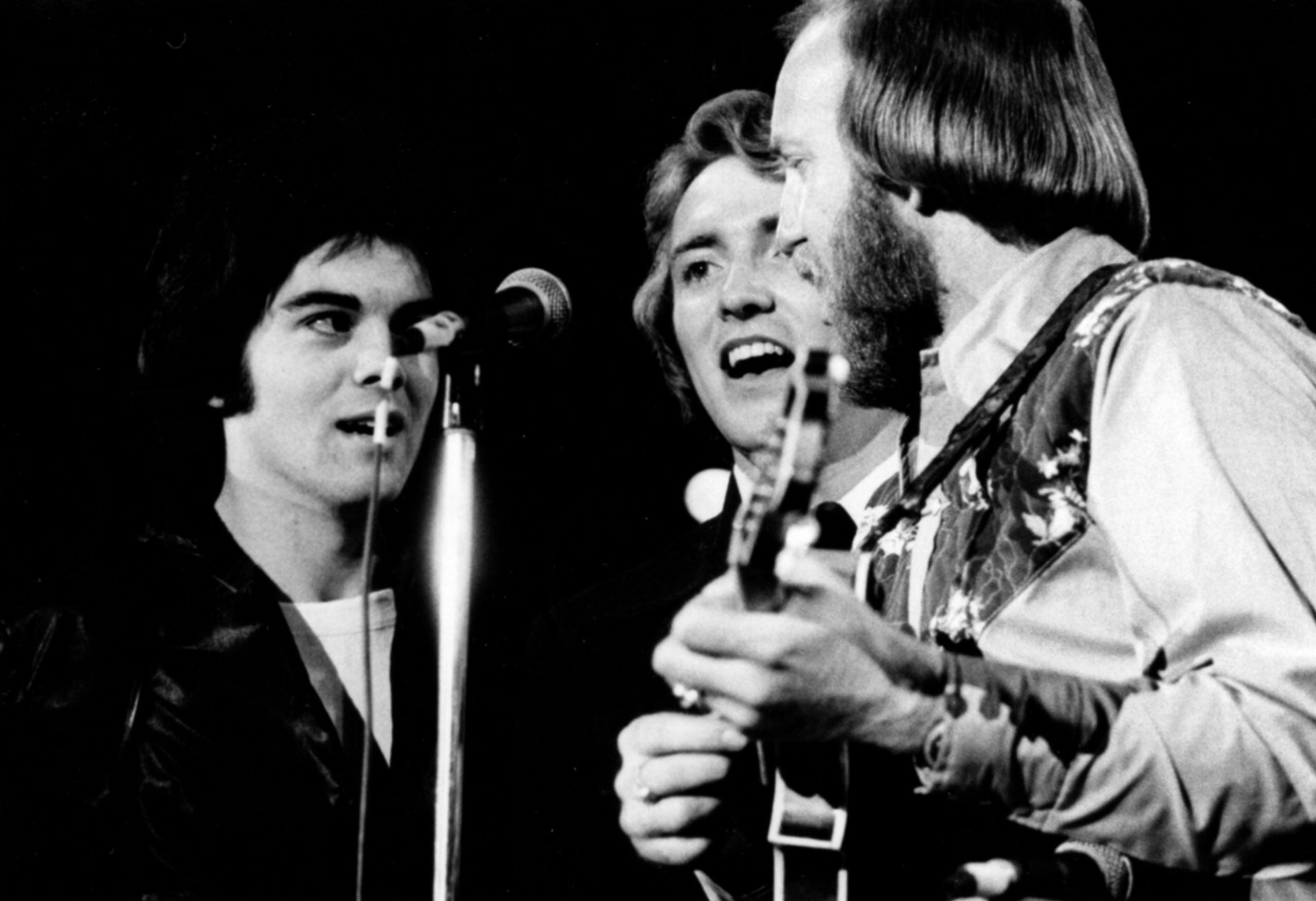 Top Right: Marty Stuart, Keith Whitley, and Doyle Lawson. Photo by Phil Straw