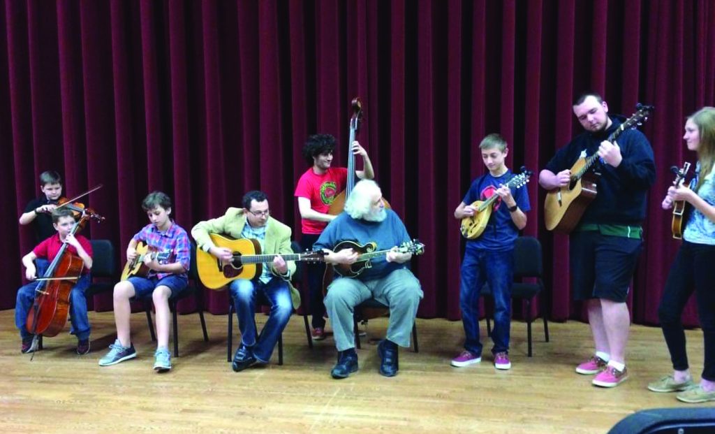 Mickey’s Acoustic Ensemble jamming with David Grisman at a master class in Tallahassee, Florida.  //  Photo by William Maxey