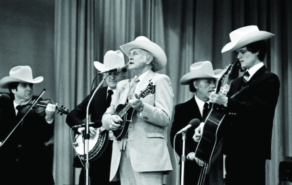 Bill Monroe and his Blue Grass Boys performing in 1986 (left to right) Glenn Duncan, Blake Williams, Bill Monroe, Tater Tate, Billy Smith