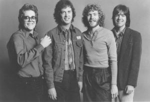 New Grass Revival group smile for a group photo