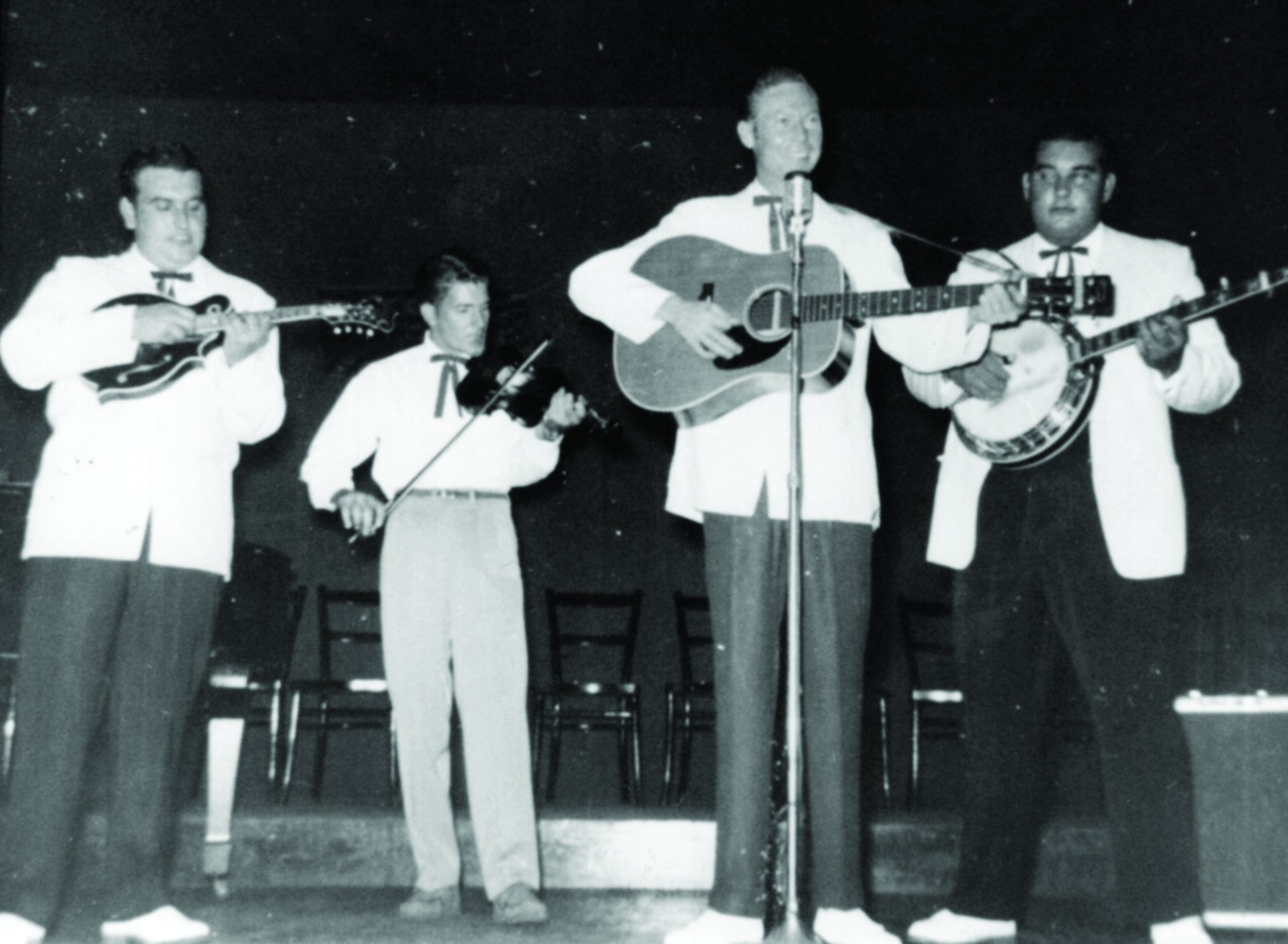 Bobby and Sonny Osborne with Red Allen in Newark, NJ. Boyce Edwards is playing the fiddle. Circa 1957 or 1958. Photo by Charles McLayan