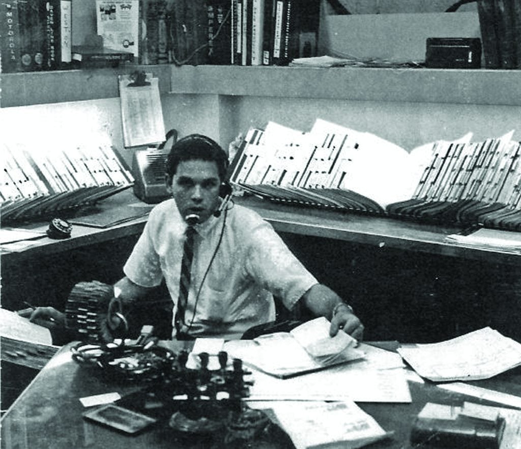 Pete taking a phone call at his desk