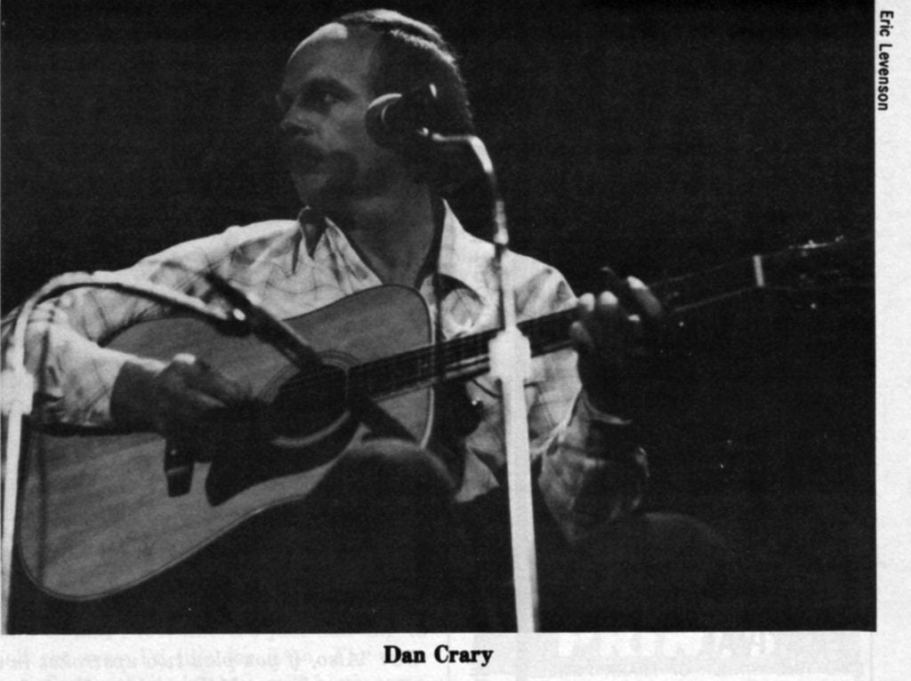 Dan Crary performing on stage.