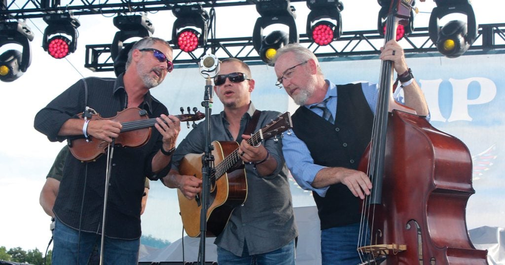 Balsam Range’s Buddy Melton, Caleb Smith, and Tim Surrett performing at ROMP 2021. Photo by Dan Miller