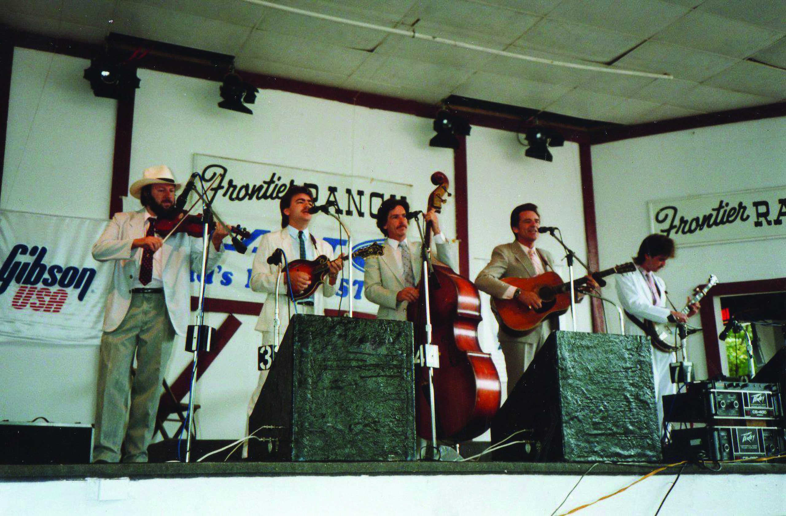 Upper: Del McCoury Band at Frontier Ranch June 24, 1990. L to R Tad Marks, Ronnie McCoury, Mike Brantley, Del McCoury and Rob McCoury.