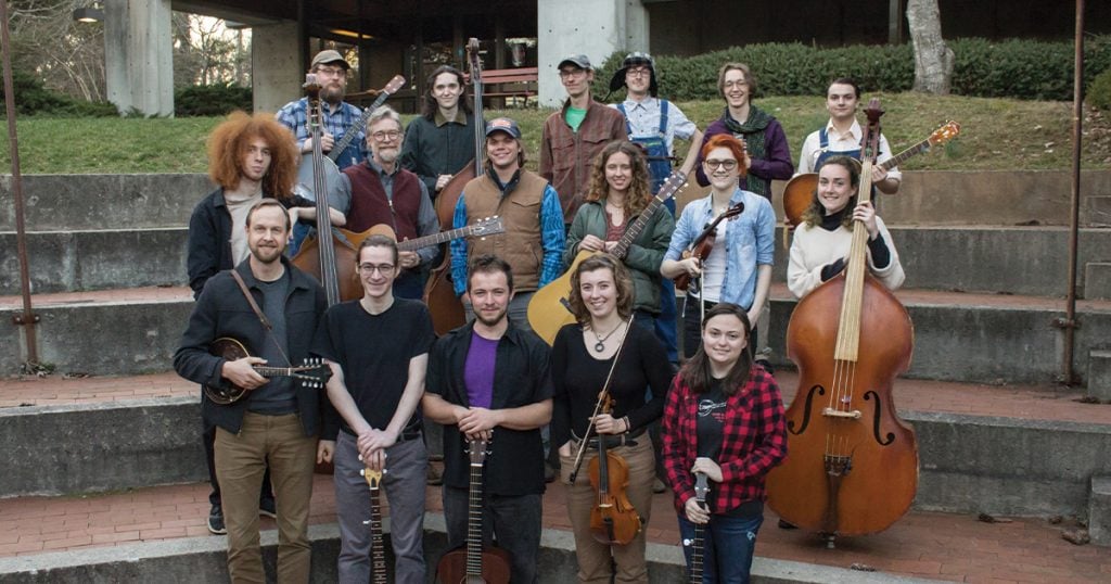 Students in the Warren Wilson College Traditional Music Program with the Department of Music Chair, Kevin Kehrberg (first row, far left) and instructor Phil Jamison (second row, second from left).