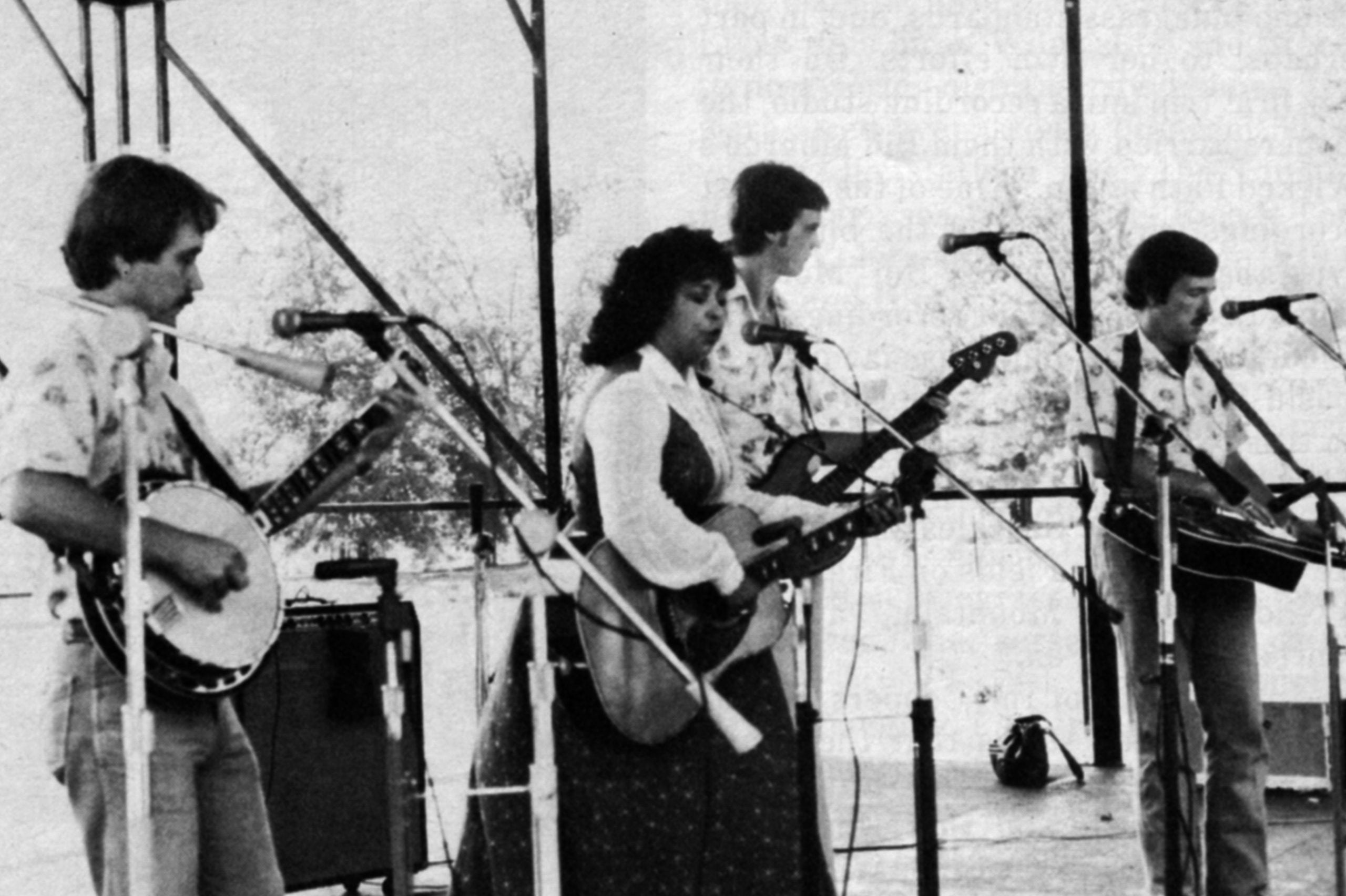 Wilma Lee Cooper and the Clinch Mountain Clan (Left to Right): Marty Lanham, Wilma Lee Cooper, Terry Smith, and Gene Wooten.  Fall 1981.