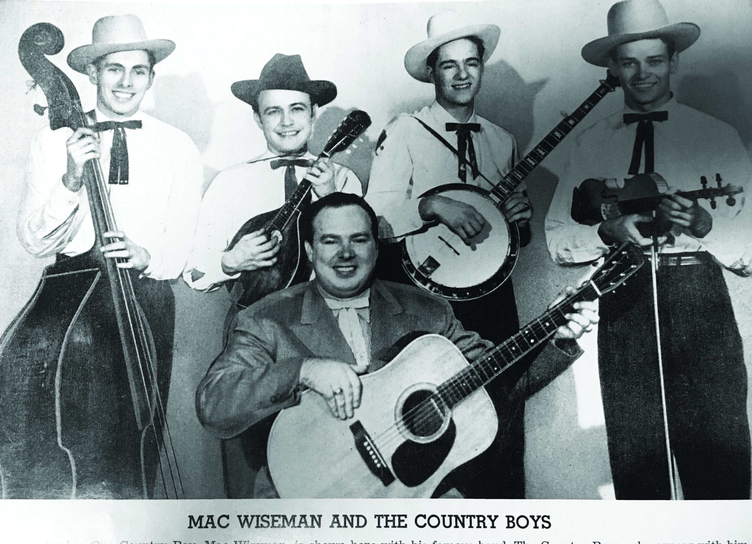 Mac Wiseman and the Country Boys (left to right): Lee Cole, Buck Graves, Mac Wiseman (seated), Don Bryant, and Curtis Lee
