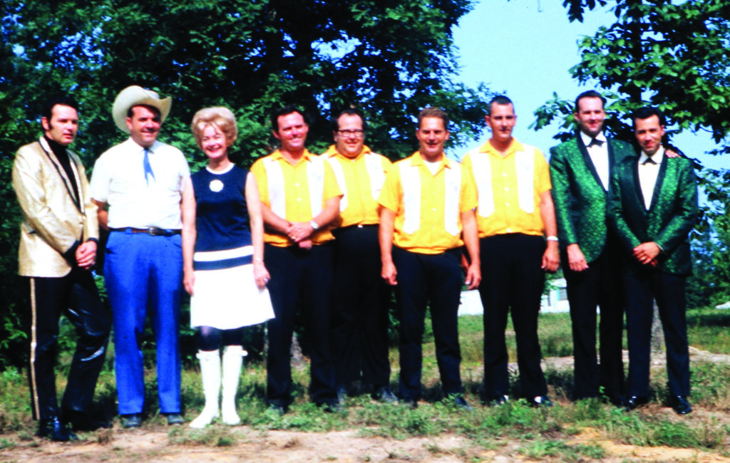Take It Easy Ranch in Callaway, Maryland, ca. July 1968. Left to right: David Houston, Rocky Willis, Patsy Stoneman, Charlie Waller, Ed Ferris, Eddie Adcock, John Duffey, Bill Emerson, and Cliff Waldron. Photo courtesy of the Emerson family.