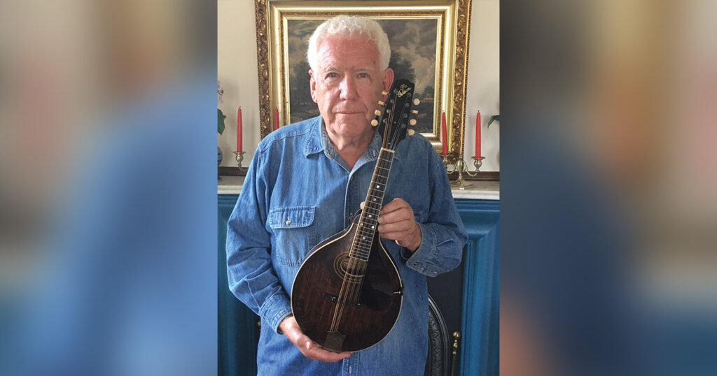 Kevin Fennessey with his restored 1922 Gibson A-2 Mandolin