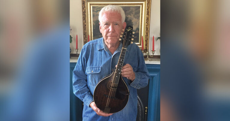 Kevin Fennessey with his restored 1922 Gibson A-2 Mandolin