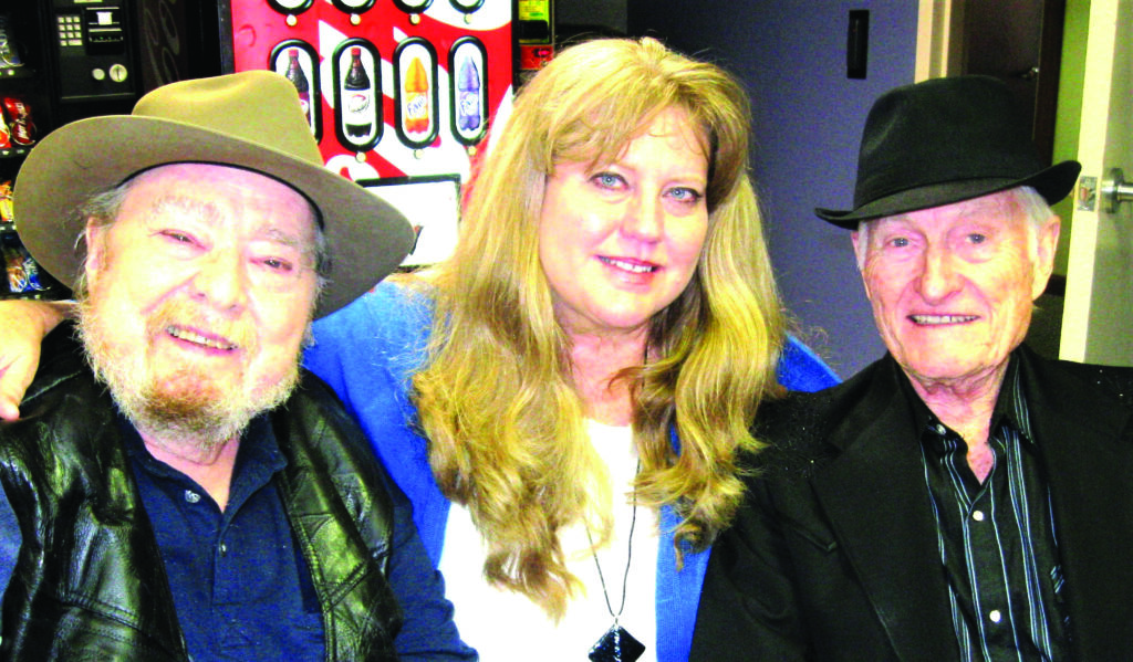 Mac Wiseman, Nancy Cardwell, and Jesse McReynolds, backstage at a Ronnie Reno television program set at NorthStar Studio in Nashville, Tennessee.