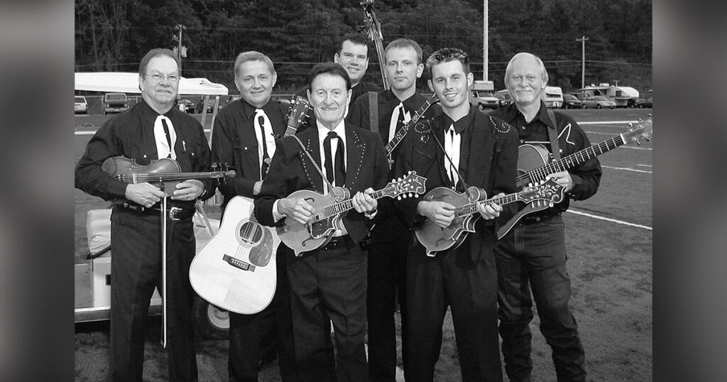 Jesse McReynolds and the Virginia Boys at Glenville State College. (Left to Right) Bobby Hicks, Charles Whitstein, Jesse McReynolds, Kent Blanton, Daniel Gridstaff, Luke McKnight and Donny Catron
