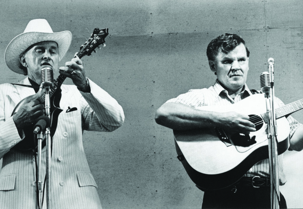  Lower: Bill Monroe performing with Doc Watson at Bean Blossom, 1971.  Photo by Ron Petronko. Courtesy of Bluegrass Music Hall of Fame and Museum.