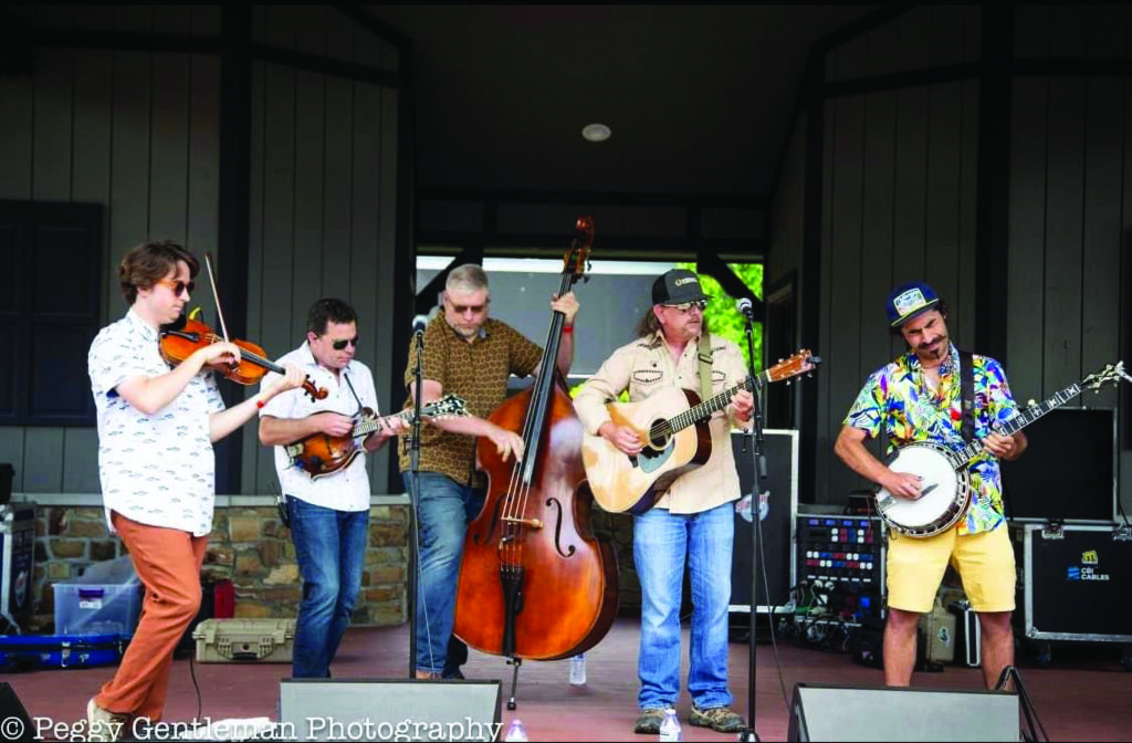 Full Cord Bluegrass (left to right): Grant Flack, Brian Oberlin, Todd Kirchner, Eric Langejans, Ricky Mier. // Photo by Peggy Gentleman