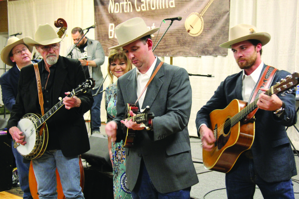 Terry Baucom performs at the North aCarolina Banjofest (left to right): Joe Hannabach, Terry Baucom, Cindy Baucom, Joey Lemons and Will Jones.  // Photo by Laura Tate Ridge