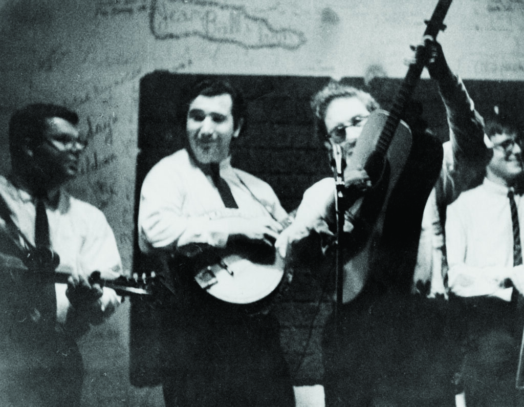 Scott Hambly, Jerry Garcia, Sandy Rothman, and Geoff Levin in San Jose, California, in early 1964.  Photo courtesy of Sandy Rothman, Bluegrass Music Hall of Fame & Museum collection.