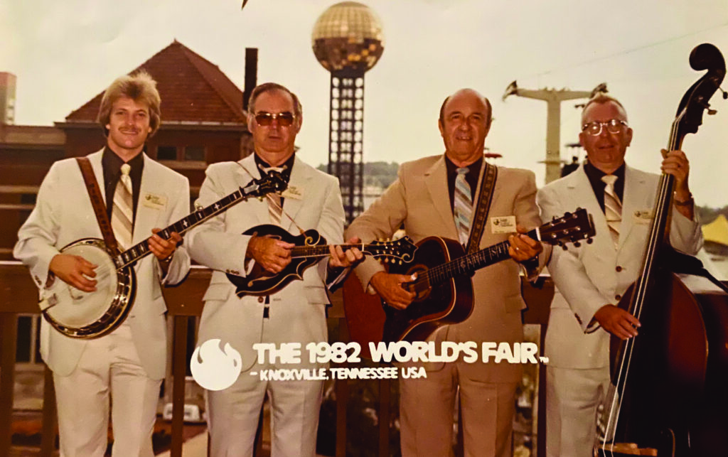 Carl Story & The Rambling Mountaineers. The 1982 World’s Fair, Knoxville, Tennessee. (left to right) Mike Scott, George Hazelwood, Carl Story and Mitchell Moser.  // Photo by World’s Fair Staff Photographer