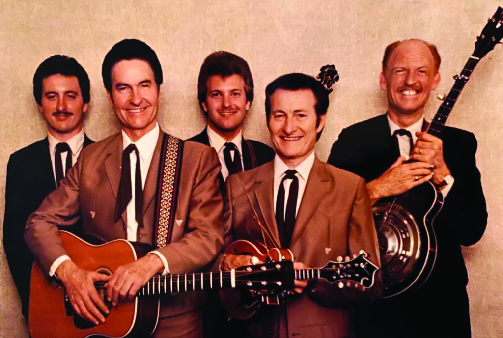 Jim & Jesse (left to right) Keith McReynolds, Jim McReynolds, Mike Scott, Jesse McReynolds and Allen Shelton. //  Photo by Les Leverett