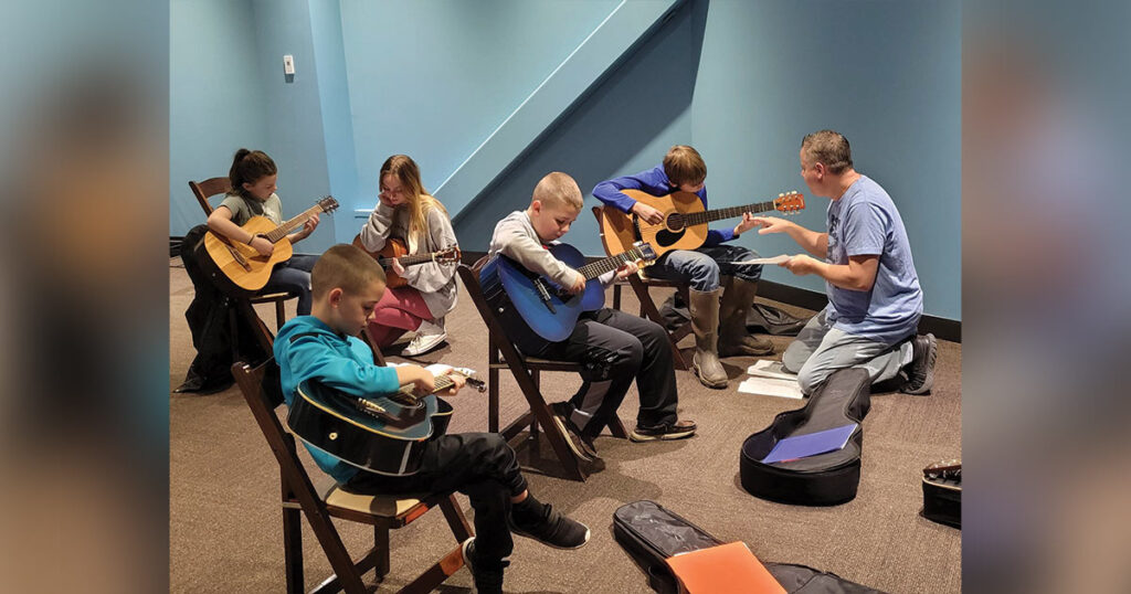 Randy Lanham teaching a guitar class. // All Photos courtesy of Bluegrass Music Hall of Fame and Museum.