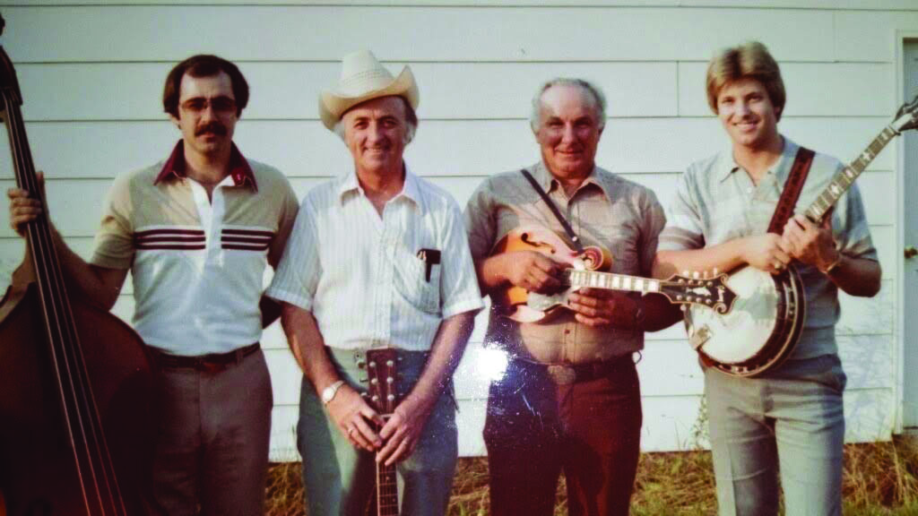 Mike Scott with the Cumberland Mountain Boys. (left to right) Cecil Ellingburg, Bill Singleton, James McCamy and Mike Scott.  //  Photo by Nell Scott