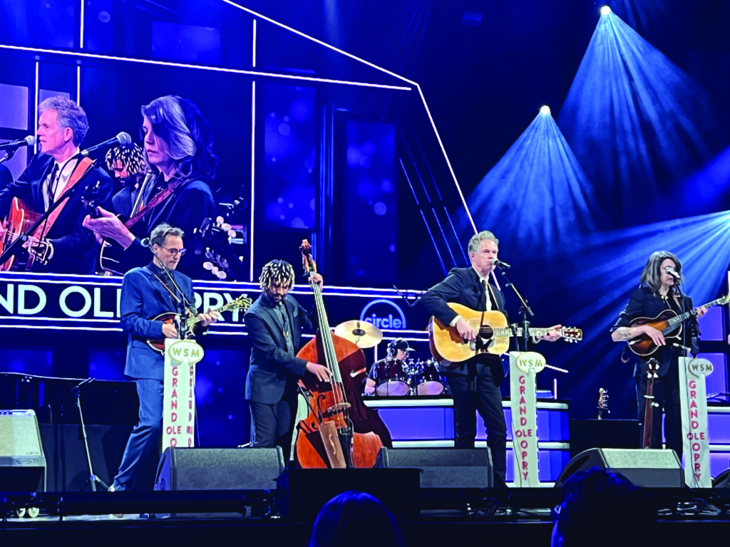 Chris Jones and the Night Drivers at the Grand Ole Opry (left to right) Mark Stoffel, Nelson Williams, Chris Jones and Grace van’t Hof. // Photo by Megan Lynch Chowning