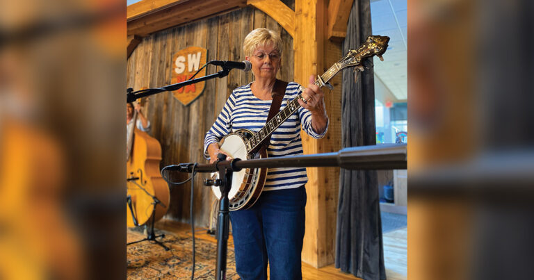 Linda Neal playing banjo at the Crooked Road jam at the Southwest Virginia Cultural Center.