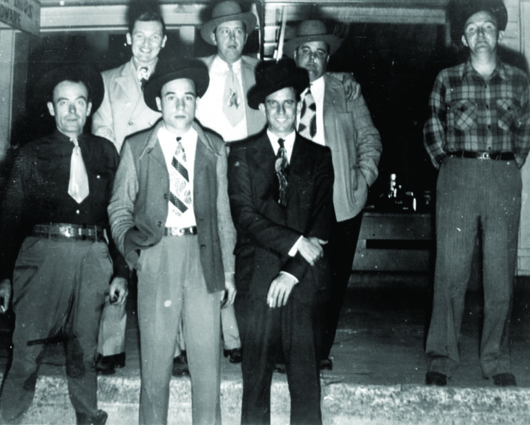 Tomie Thompson featured with Bill Monroe and his Blue Grass Boys in DeRidder, Louisiana, ca. 1946. Front row, left to right: Tomie Thompson, Earl Scruggs and Howard Watts (Cedric Rainwater); back row, left to right: Jimmy Kish, Bill Monroe, Chubby Wise and Lester Flatt