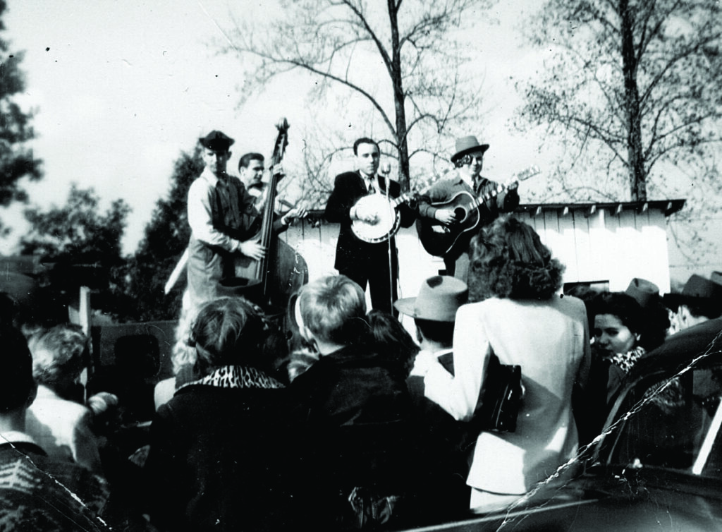 An early show featuring the Foggy Mountain Boys in 1948 L-R: Cedric Rainwater, unidentified fiddle player, Earl Scruggs, and Mac Wiseman.