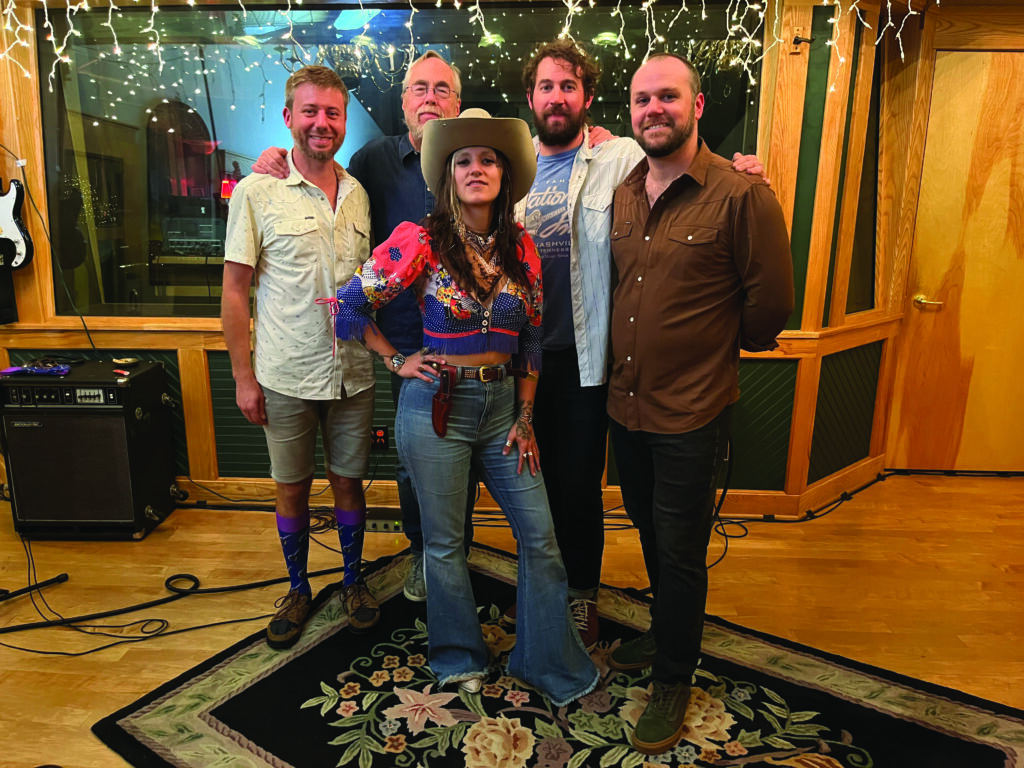 Sierra Ferrell and 
band with Tony Trischka.  
Photo by Ethan Greek