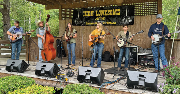 Justin Freeman (guitar), Troy Jackson (bass), Amelia Freeman (mandolin), Savannah Hardin (guitar), Elijah Freeman (banjo) and Daniel Hardin (banjo). Amelia, Savanna, Elijah and Daniel are all High Lonesome Strings scholarship winners. Photo by Pammy Davis Lassiter