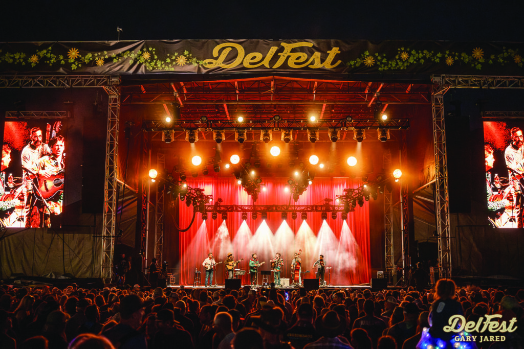 The Travelin’ McCourys on stage at DelFest with Lukas Nelson. // Photo by Gary Jared