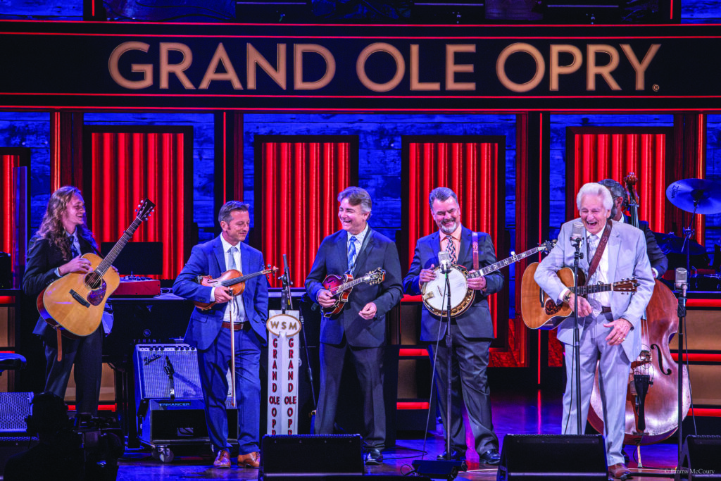 The Del McCoury Band at the Grand Ole Opry.  (left to right) Heaven McCoury, Jason Carter, Ronnie McCoury, Rob McCoury, Del McCoury and Alan Bartram (hidden).
Photo by Emma McCoury