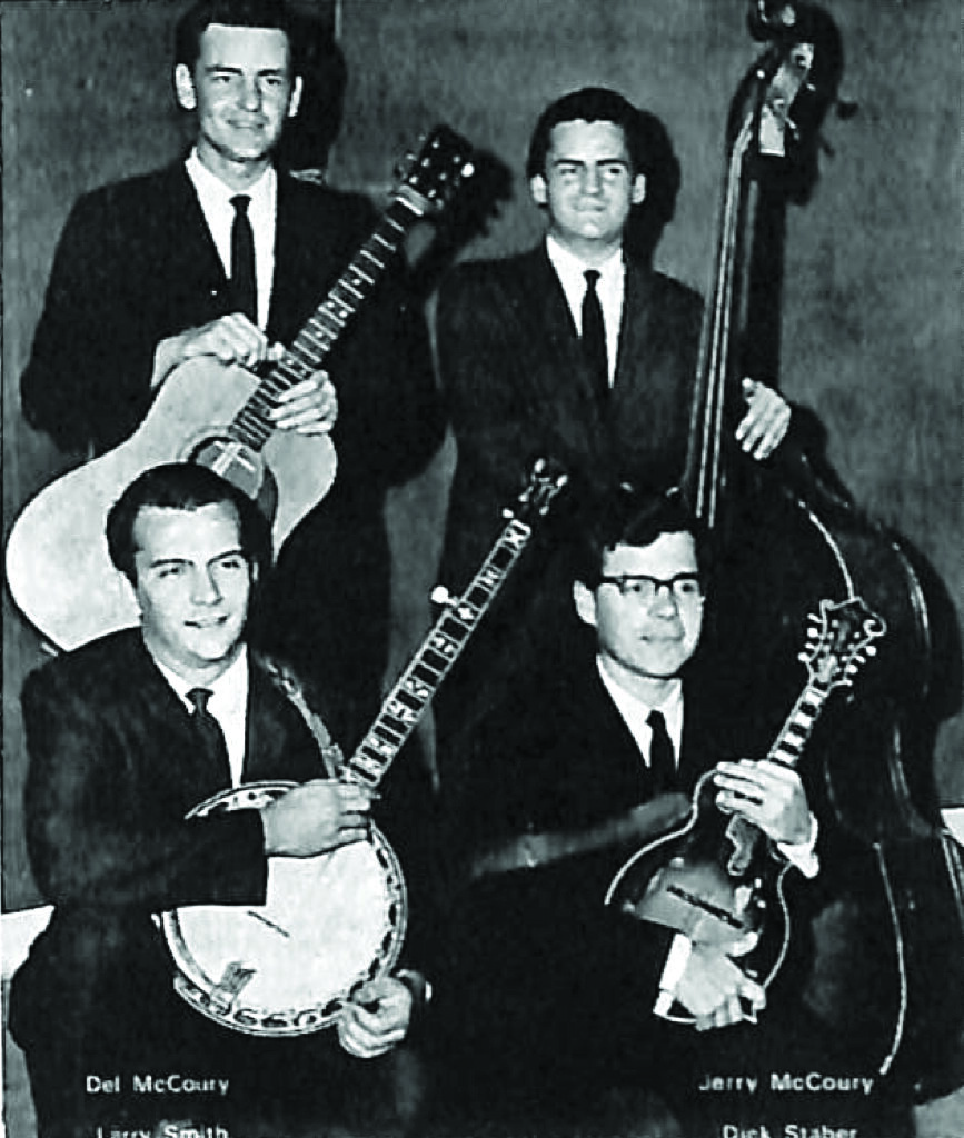 Del McCoury and the Dixie Pals—(standing) Del and Jerry McCoury, (kneeling) Larry Smith (banjo) and Dick Staber (mandolin).  Photo Courtesy of Bluegrass Unlimited Archives.