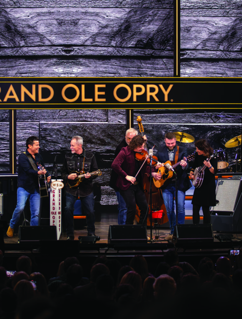 The Grascals performing at the Grand Ole Opry.  (L to R) Jamie Johnson, Danny Roberts, Terry Smith, Jamie Harper, John Bryan and Kristin Scott Benson.  Photo by Laci Mack