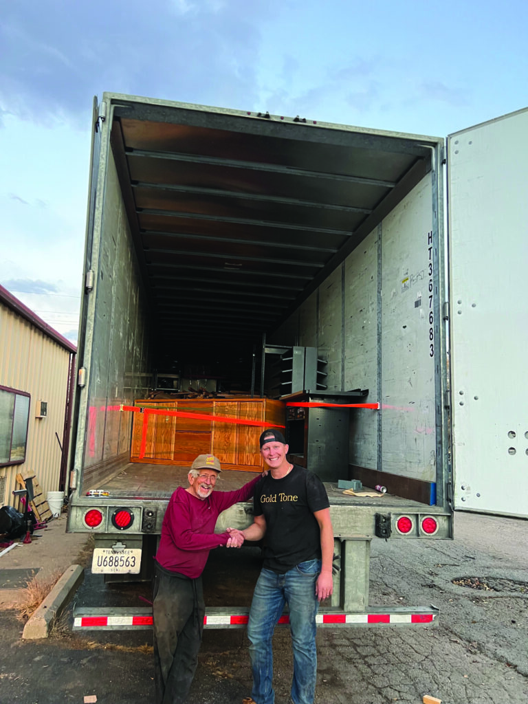 Ome founder Chuck Ogsbury and Gold Tone Operations Manager Justin Grizzle loading up the Ome shop in Colorado for the move to Florida