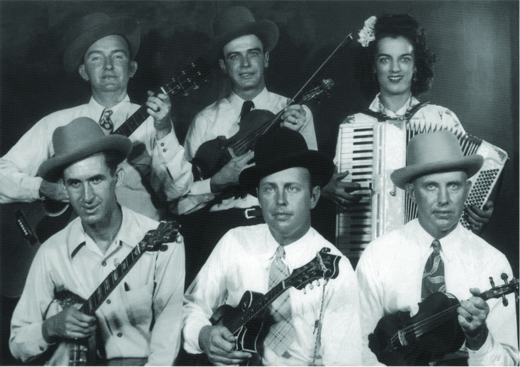 Bill Monroe and his Blue Grass Boys, 1945 (back row, left to right) Lester Flatt, Jim Shumate, Sally Ann Forrester (front row) Dave “Stringbean” Akeman, Bill Monroe, Birch Monroe. Bluegrass Unlimited Magazine Archives