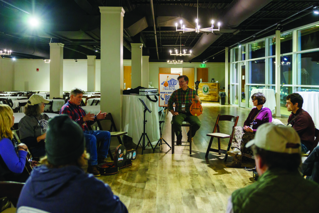 Scott Napier teaching the mandolin group