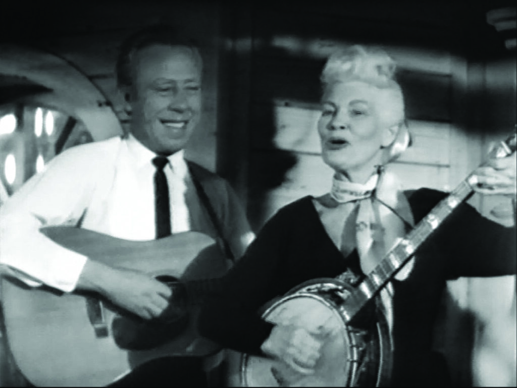 George Shuffler and his circa 1955 Martin D-18 guitar backing up Cousin Emmy while on tour in Germany in March 1966.